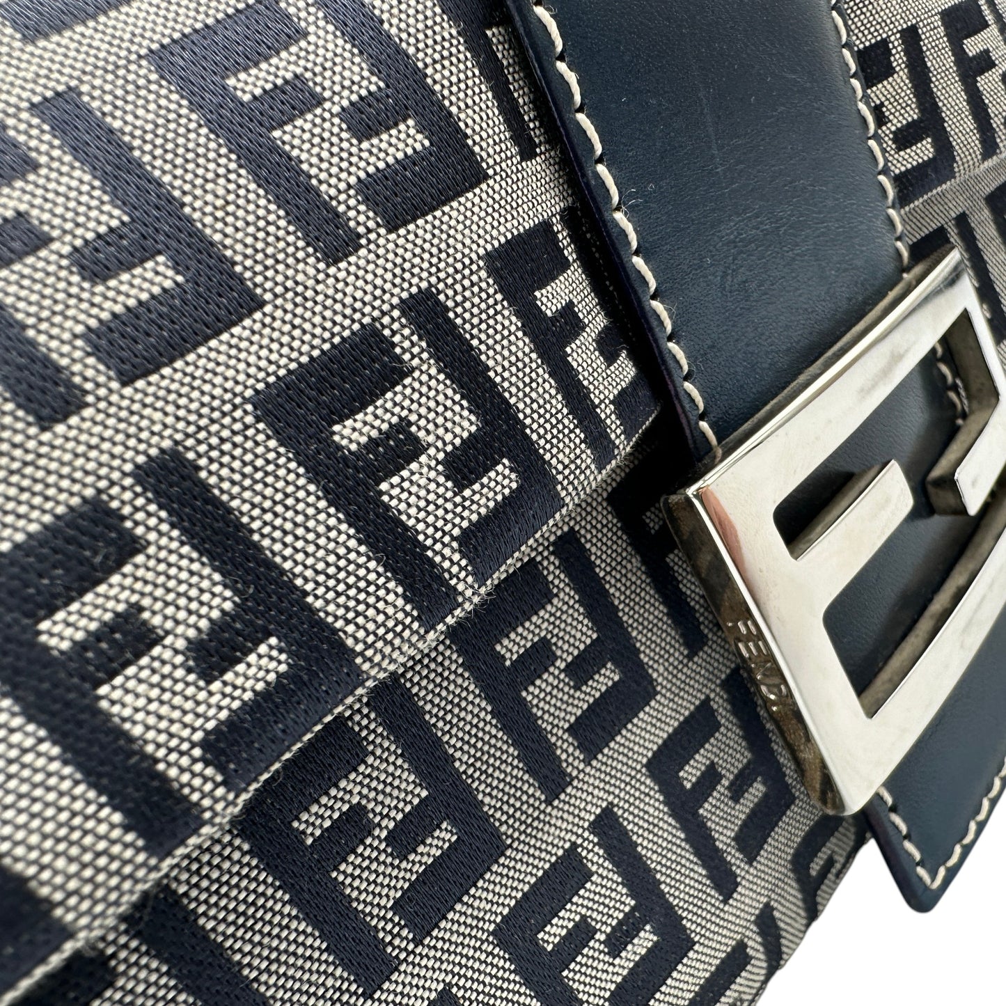 Thanks it's Vintage Fendi Zucchino Mamma shoulder bag in navy and grey monogram canvas with silver FF hardware